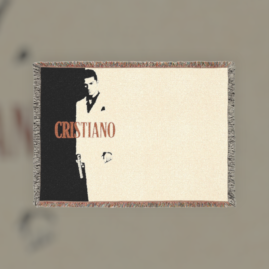 Futbol Addict Cristiano Scarface woven cotton blanket featuring a black and white portrait with colorful fringed edges.