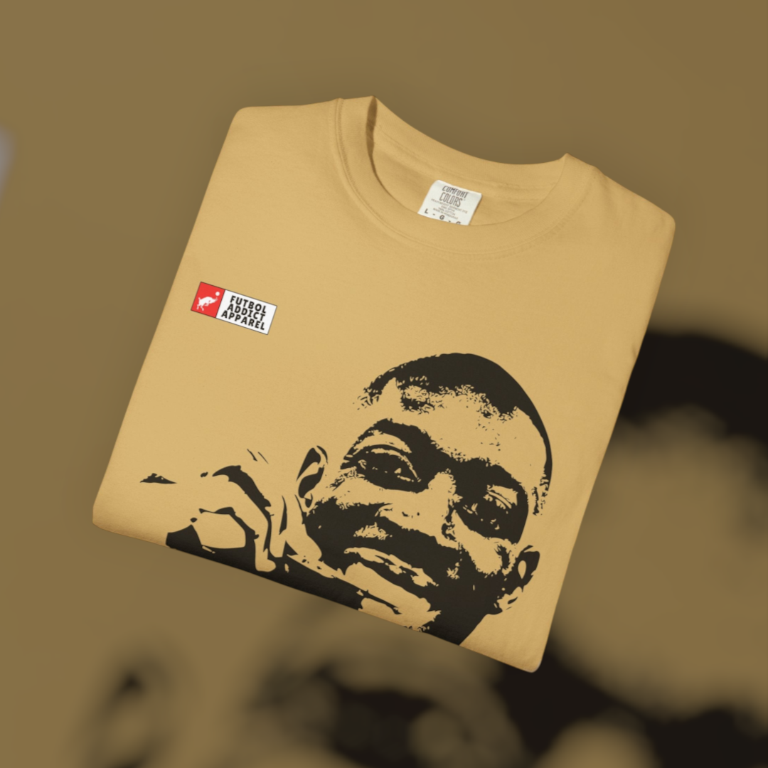 Futbol Addict oversized tan cotton graphic tee featuring a black portrait print of Ousmane Dembele