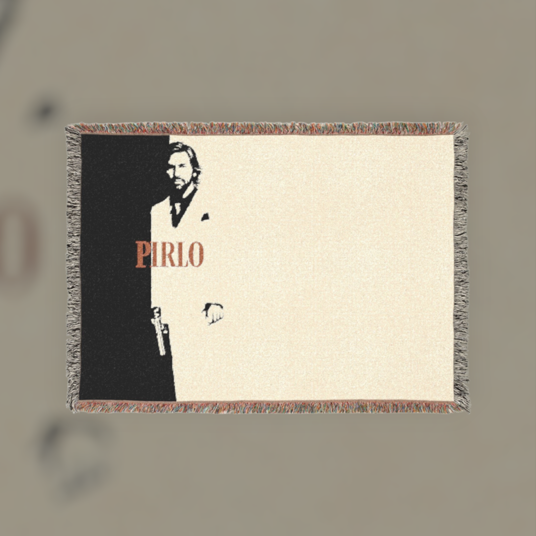Futbol Addict Pirlo Scarface woven cotton blanket featuring a black and white portrait with colorful fringed edges.