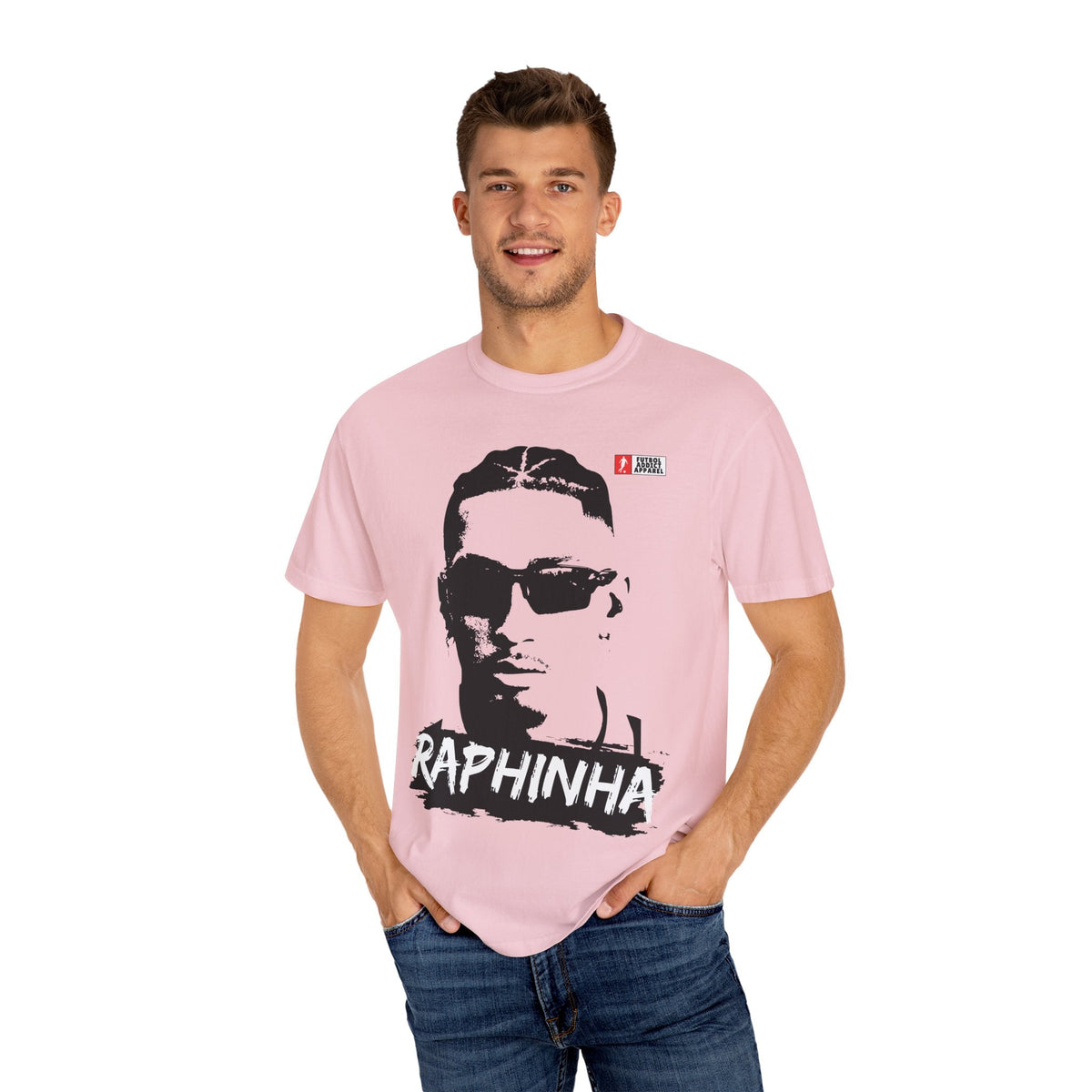 Futbol Addict oversized light pink cotton graphic tee featuring a black and white portrait of soccer player Raphinha