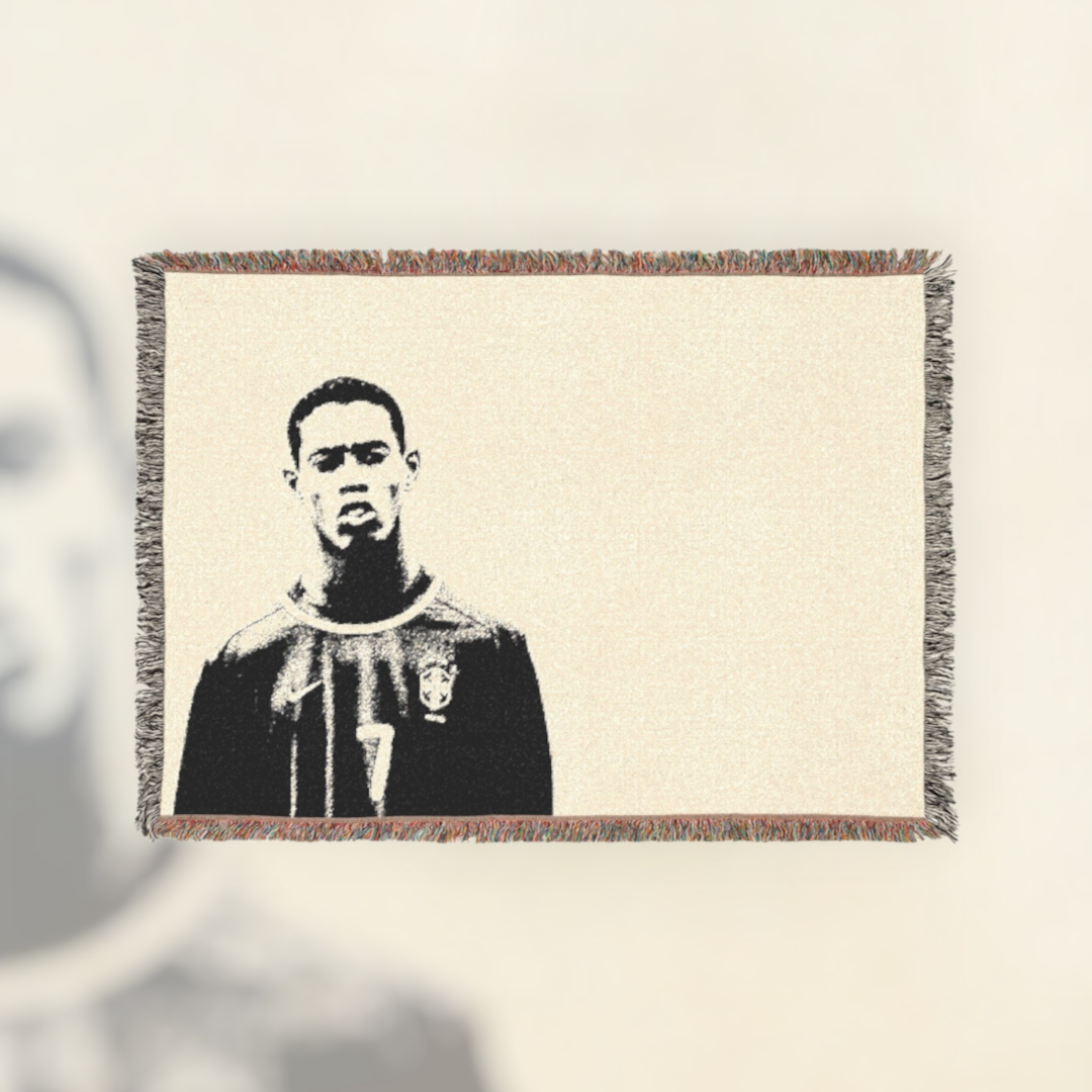 Futbol Addict woven cotton blanket featuring a portrait of young Ronaldinho with colorful fringed edges