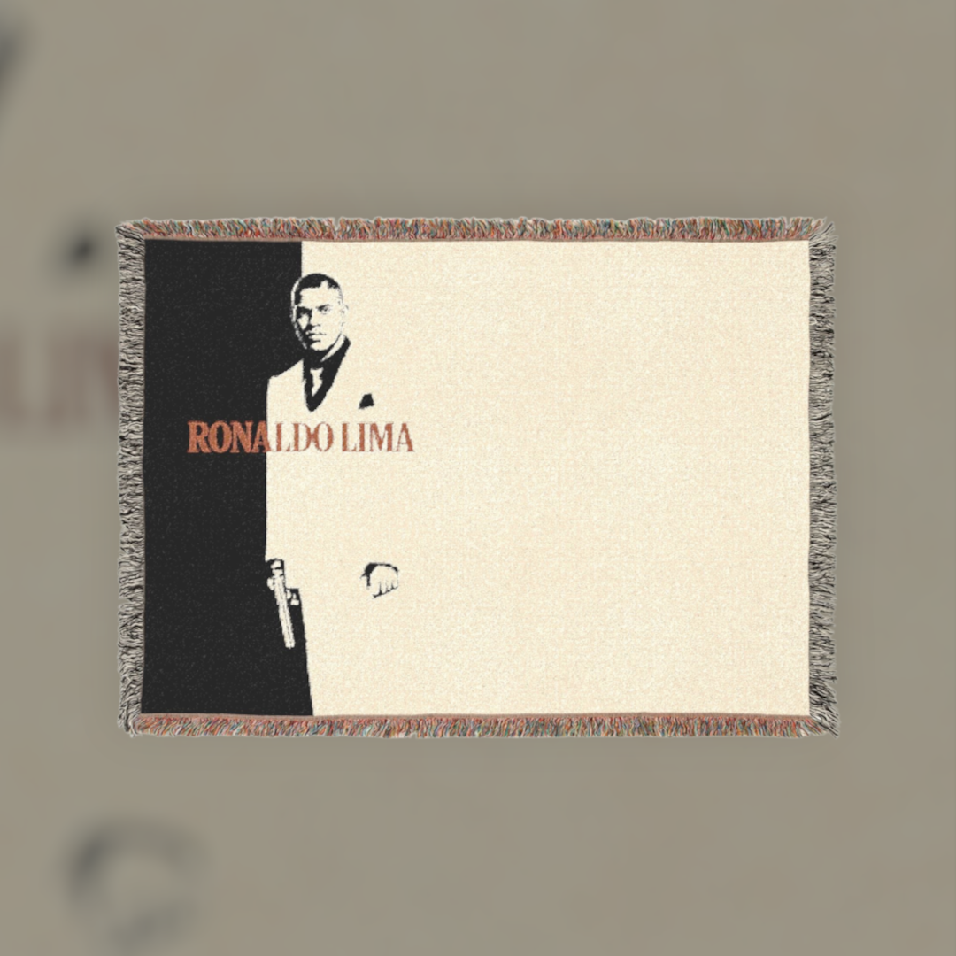 Futbol Addict Ronaldo Lima Scarface woven cotton blanket featuring a black and white portrait with fringed edges.