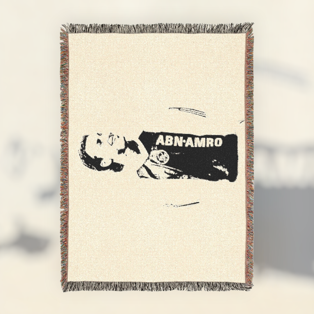 Futbol Addict Zlatan Ibrahimovic woven cotton blanket featuring a black and white graphic with colorful fringed edges.