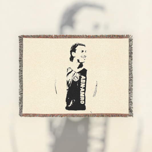 Futbol Addict Zlatan Ibrahimović woven cotton blanket featuring a black and white portrait with colorful fringed edges.